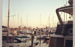 boats on the water at sunset