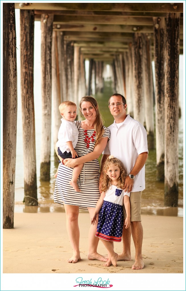 posing under the pier