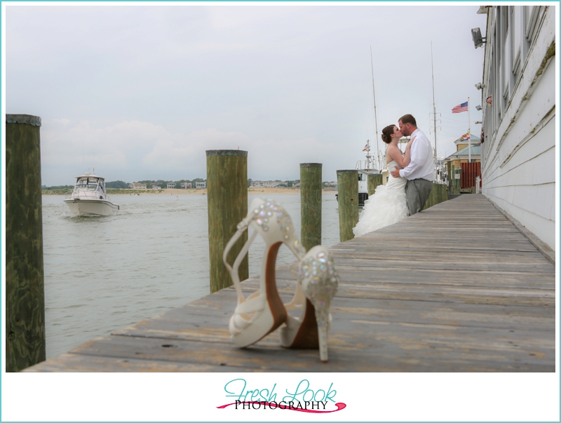 bride and groom on the dock