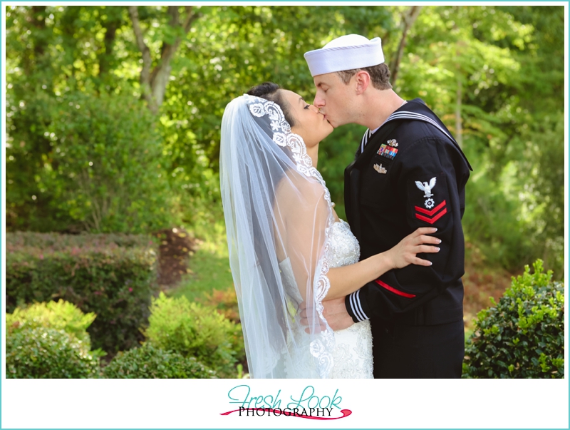 bride and groom kissing