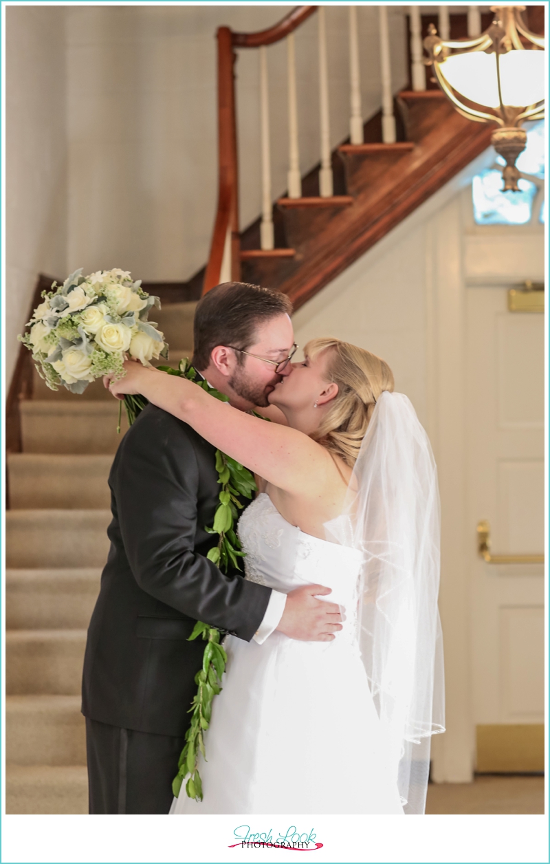 bride and groom kissing