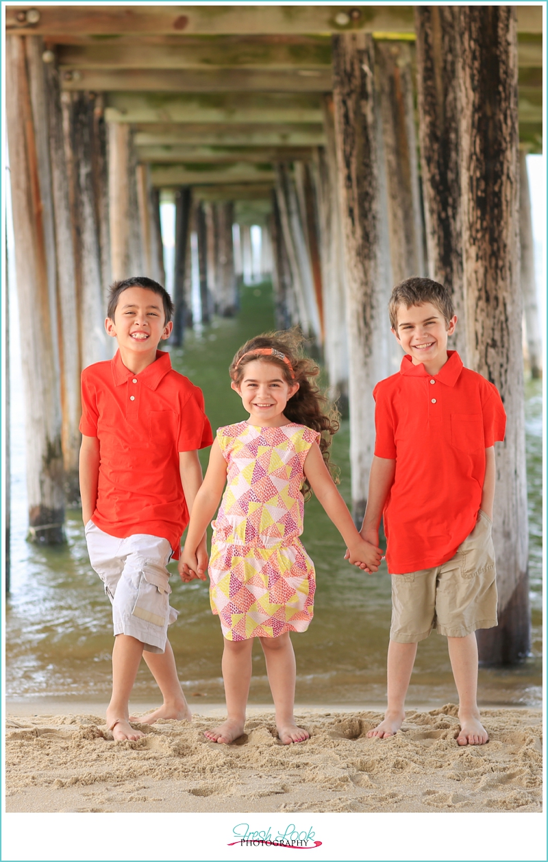 siblings on the beach