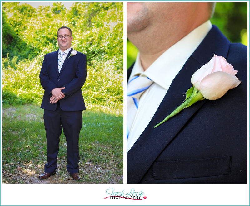 groom with pink rose boutonniere