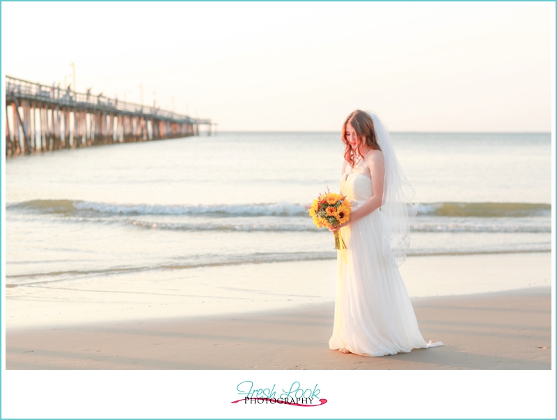 bride on the beach at sunset
