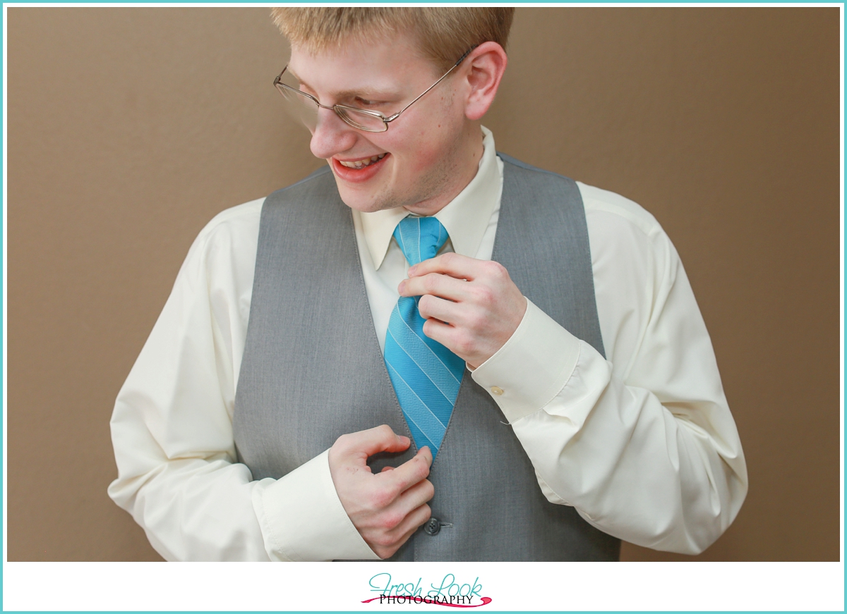 groom getting dressed