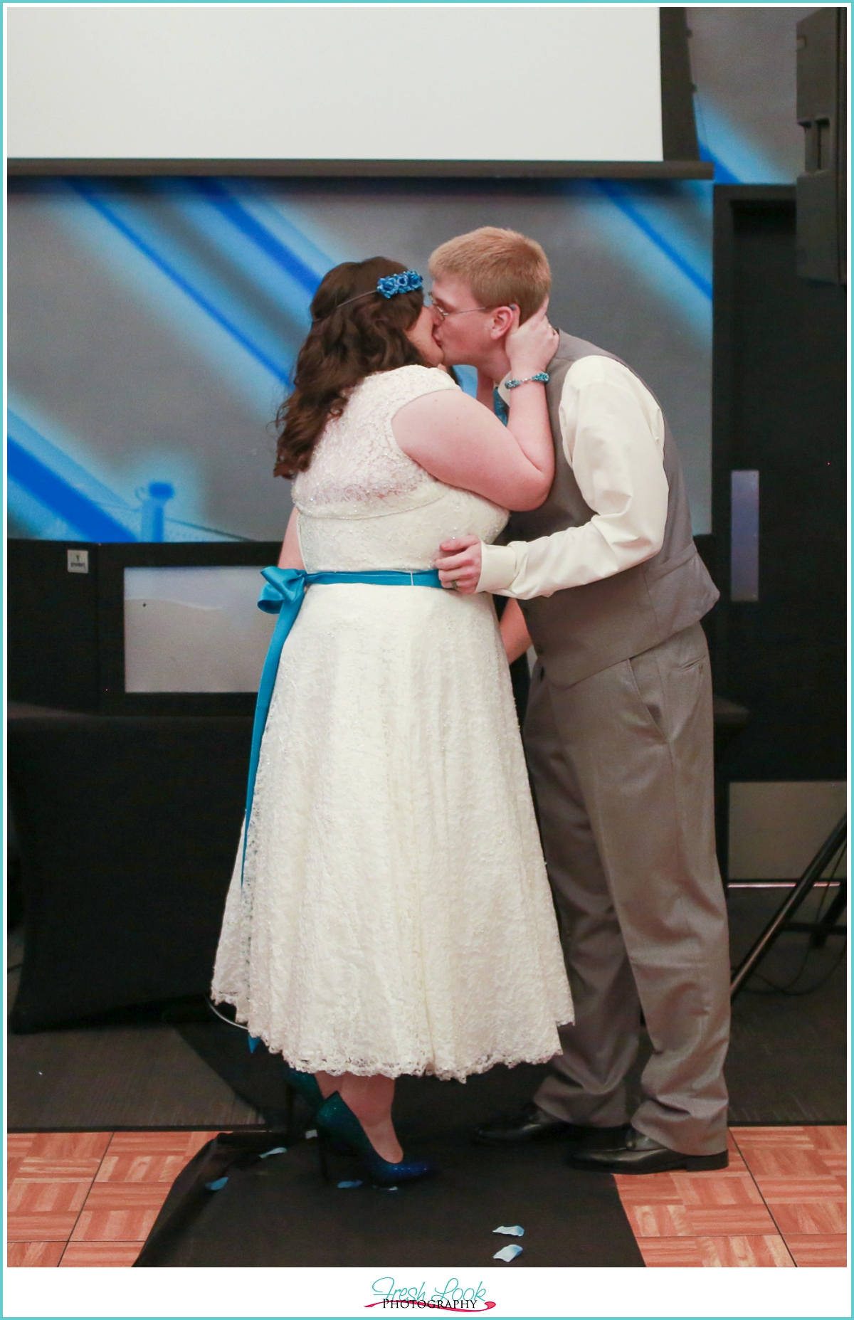 kiss the bride at the wedding