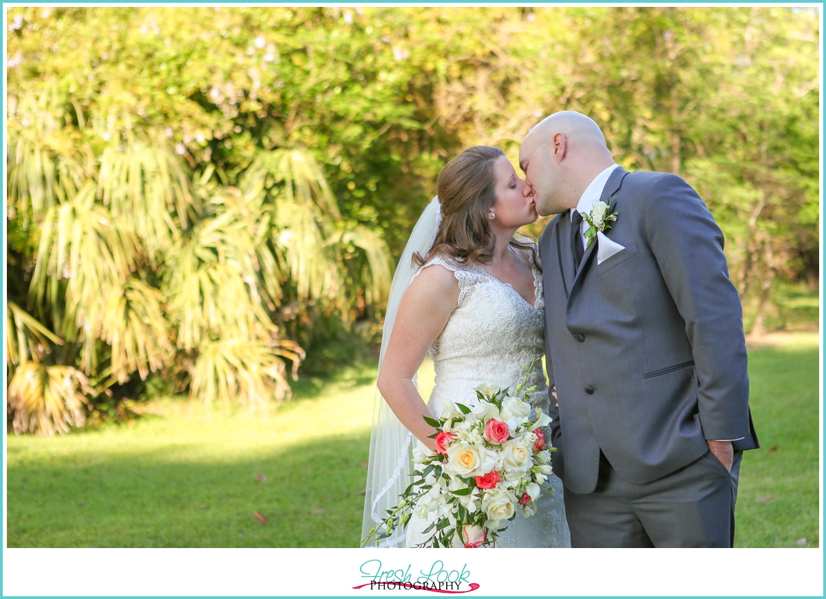 bride and groom kissing