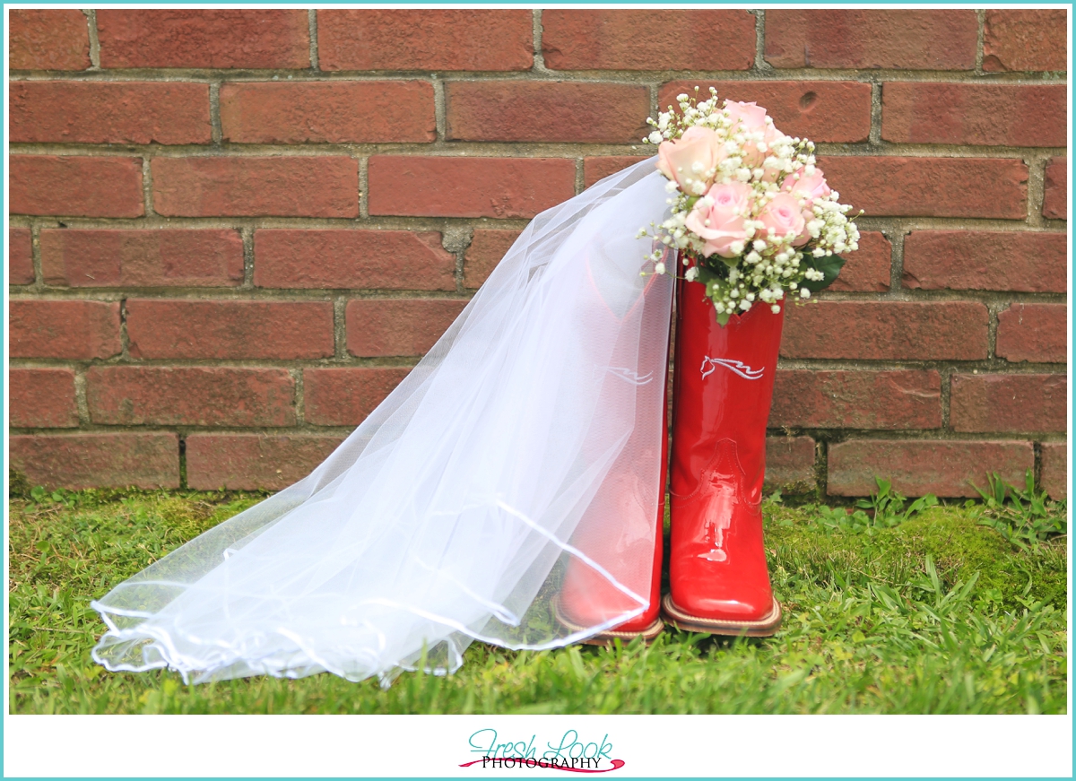 bride wearing cowboy boots