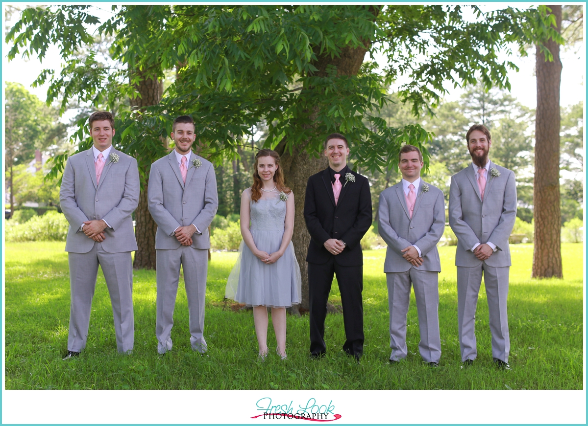 groomsmen in gray suits