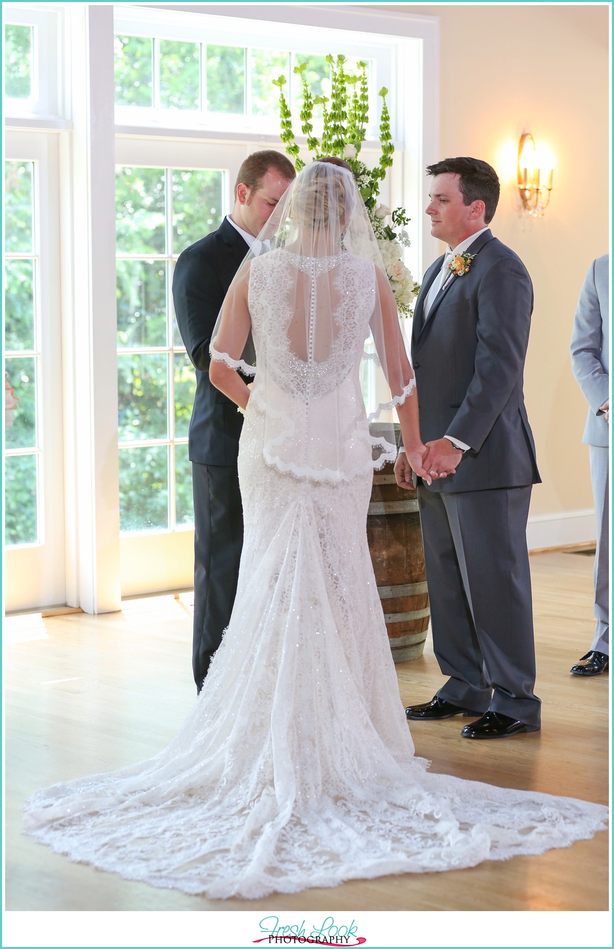 holding hands during the wedding