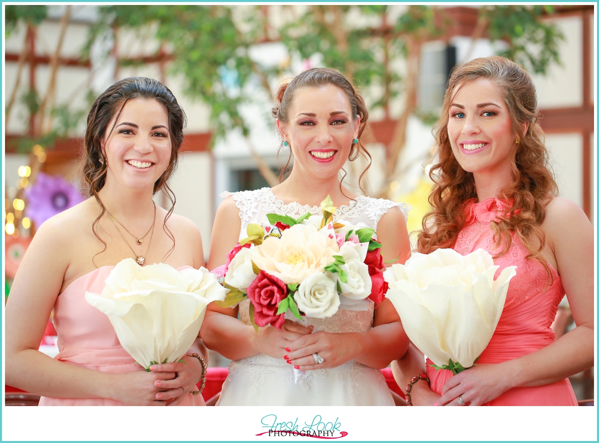 bridesmaids with paper flowers