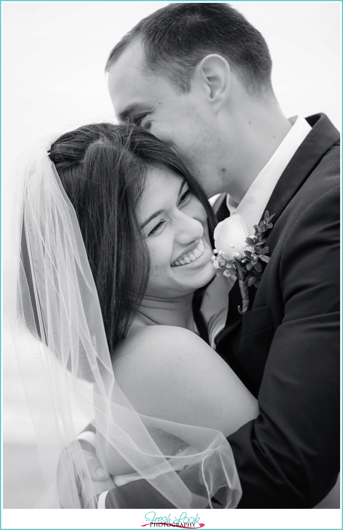 bride and groom laughing