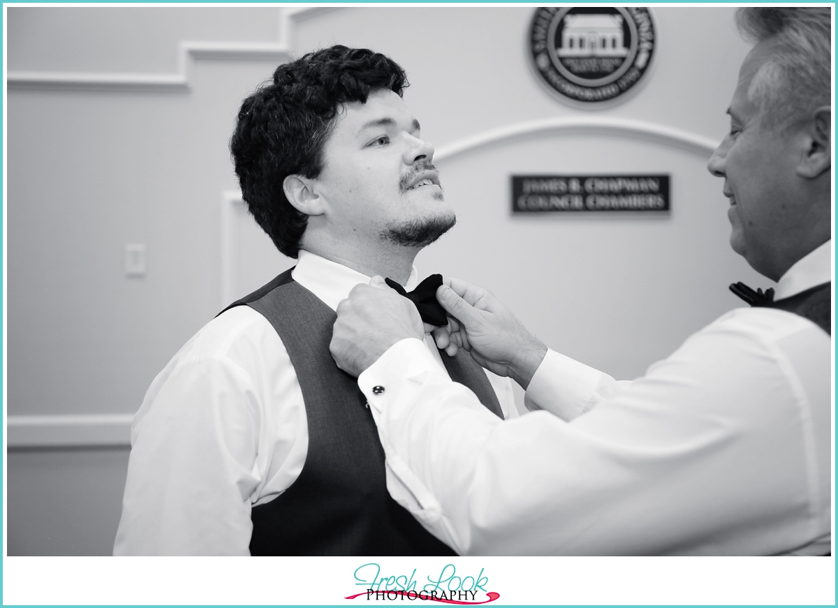 groom getting dressed