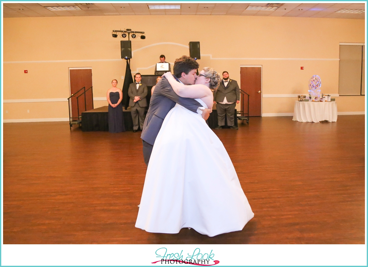 bride and groom kiss