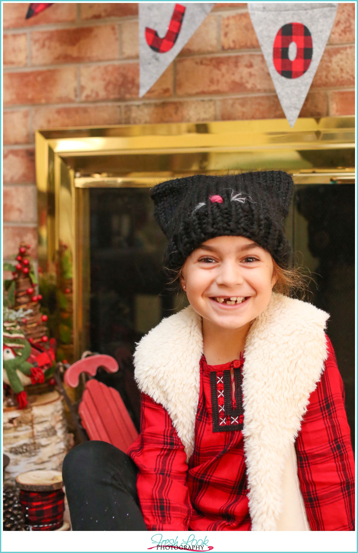 little lady wearing cat hat