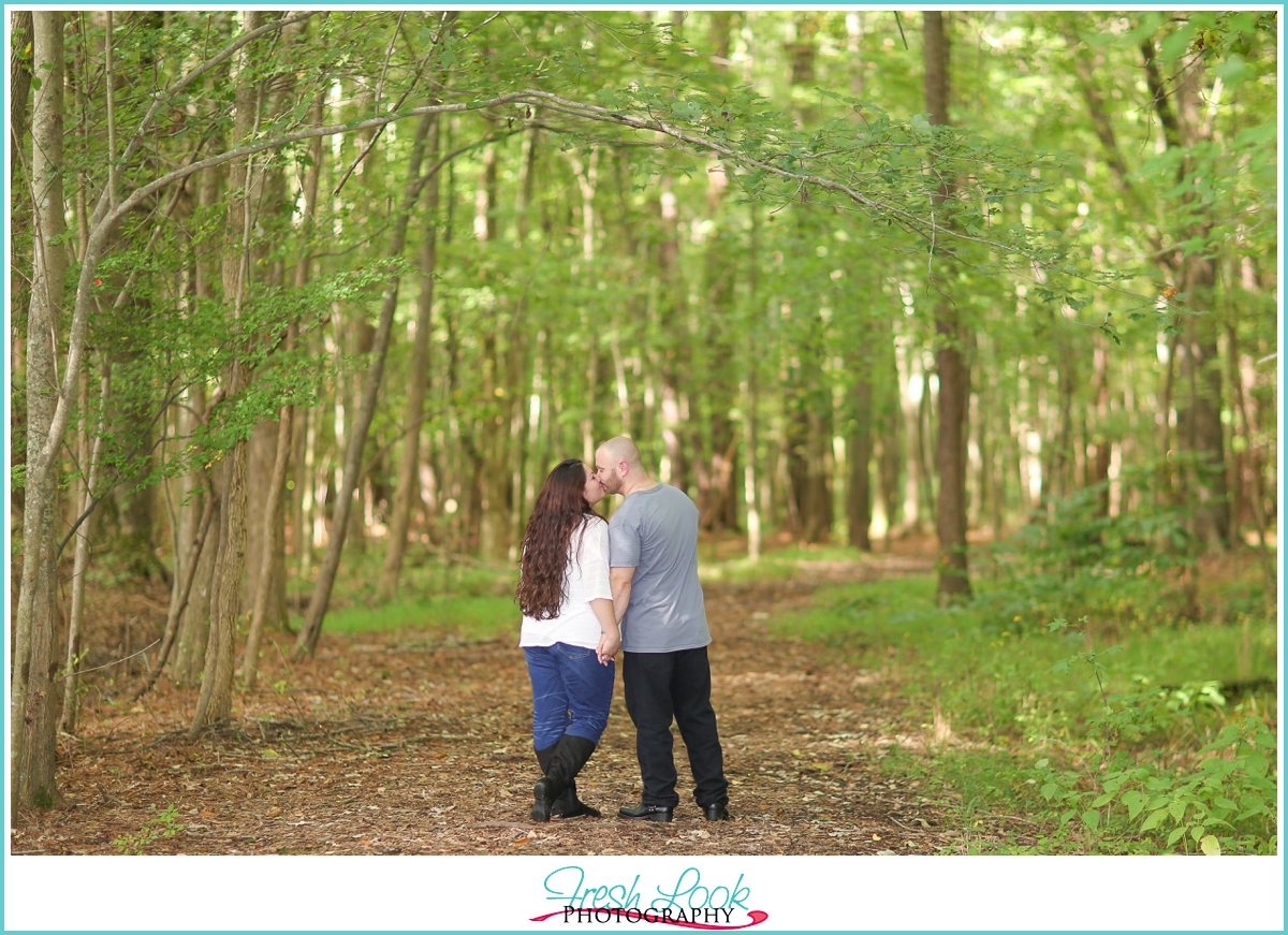 woodsy flirty engagement shoot