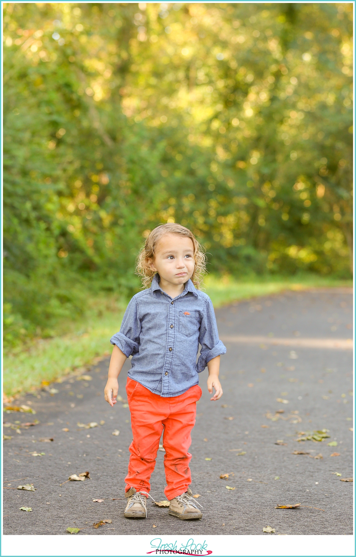 little boy being thoughtful