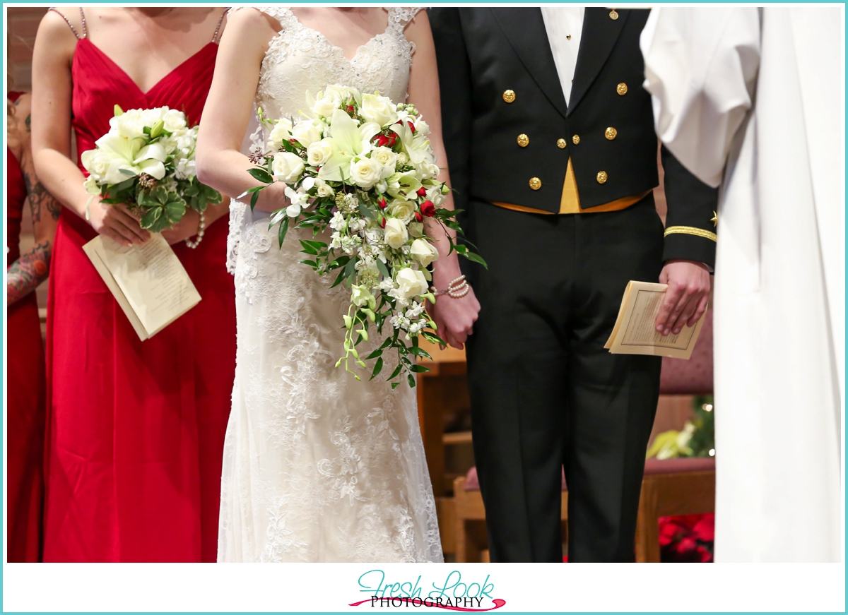 bride and groom holding hands