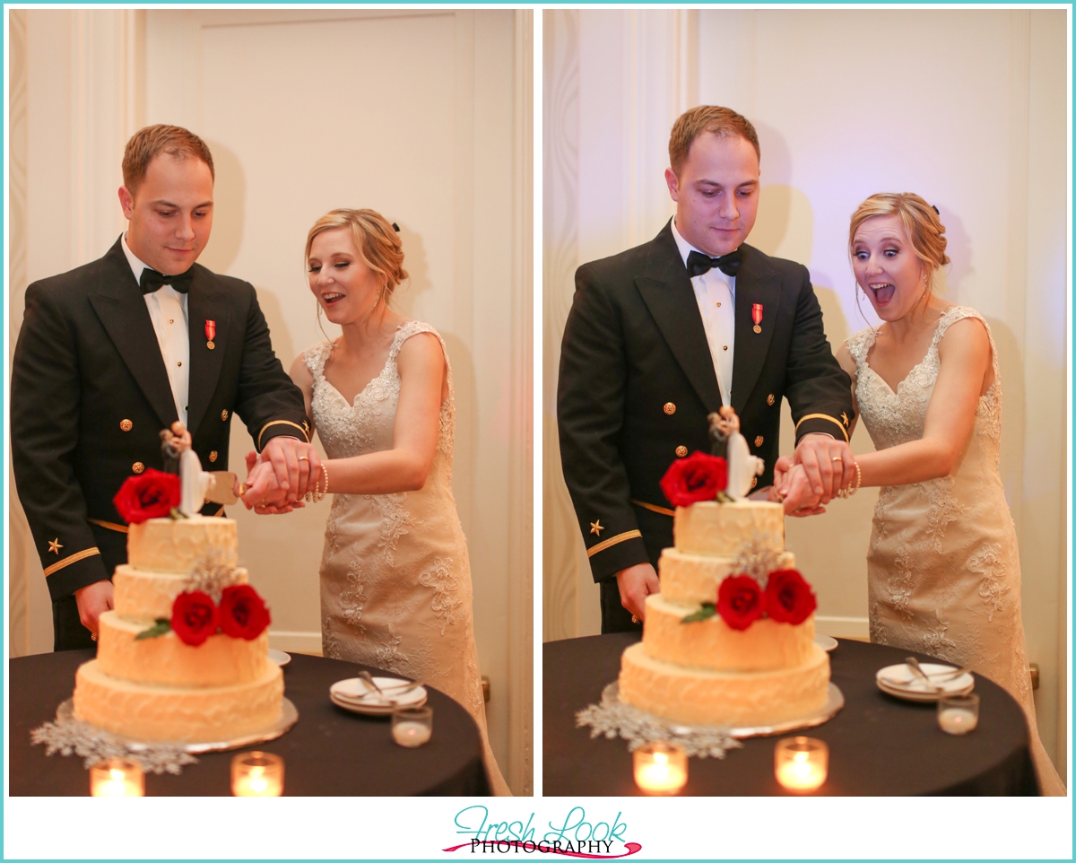 bride and groom cutting cake