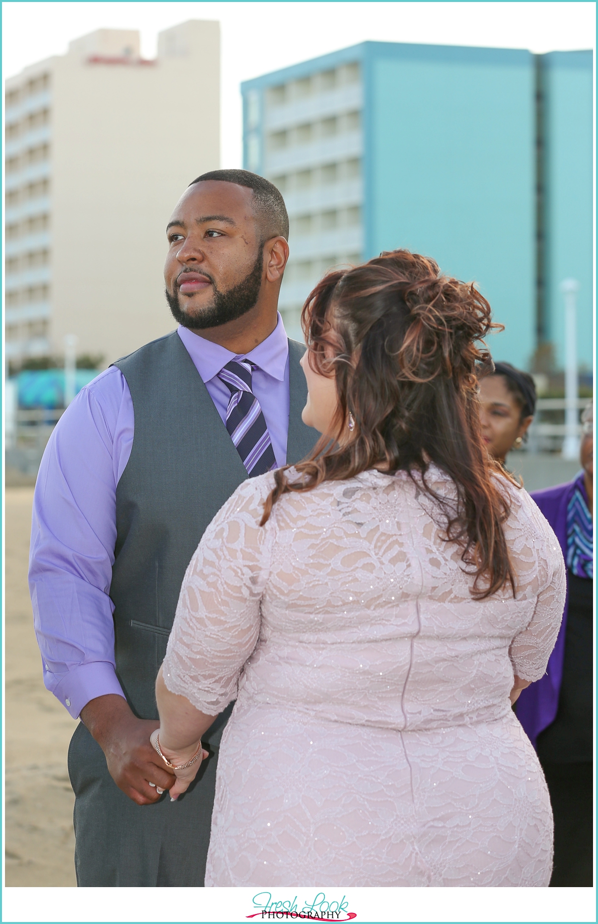 groom in purple and gray