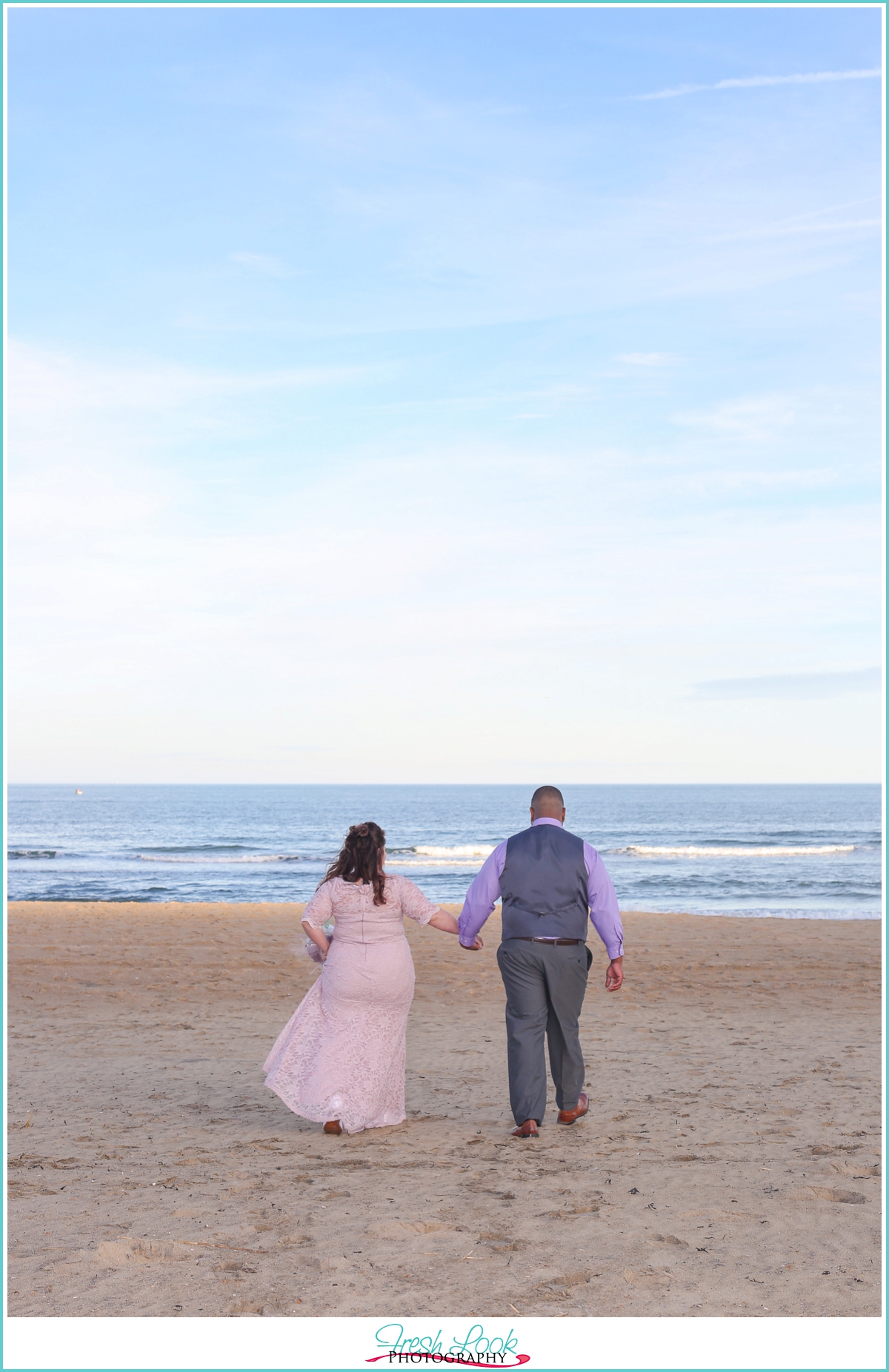 hand in hand on the beach