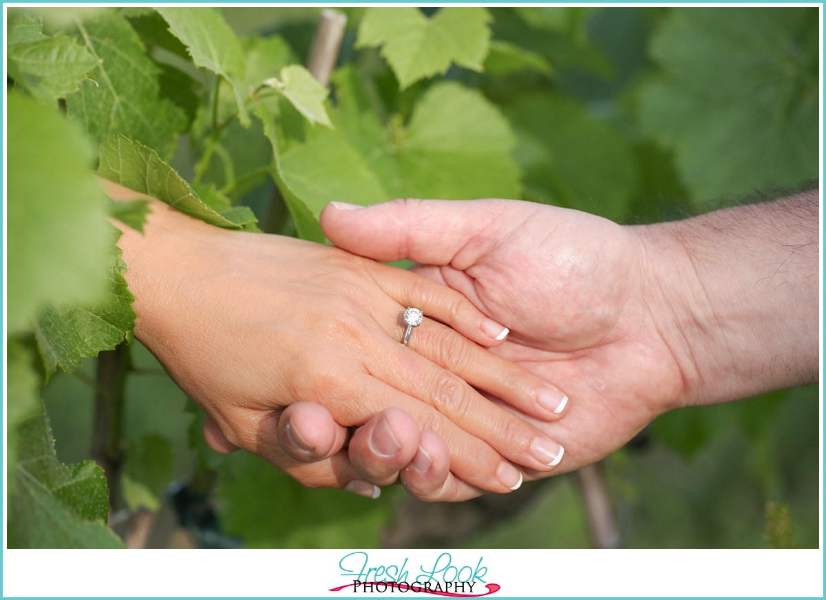 showing off the engagement ring