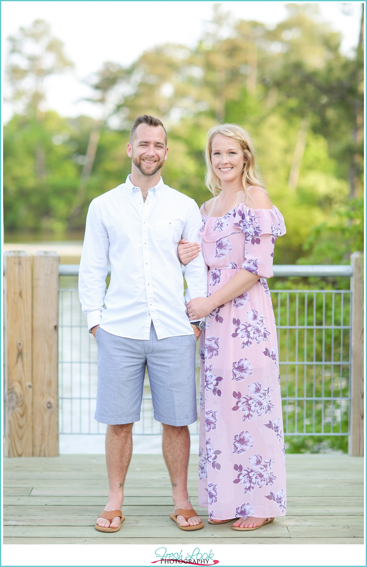 couples photos on the dock