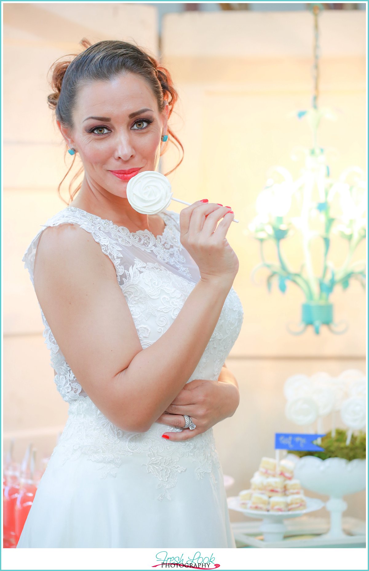 bride eating a wedding favor