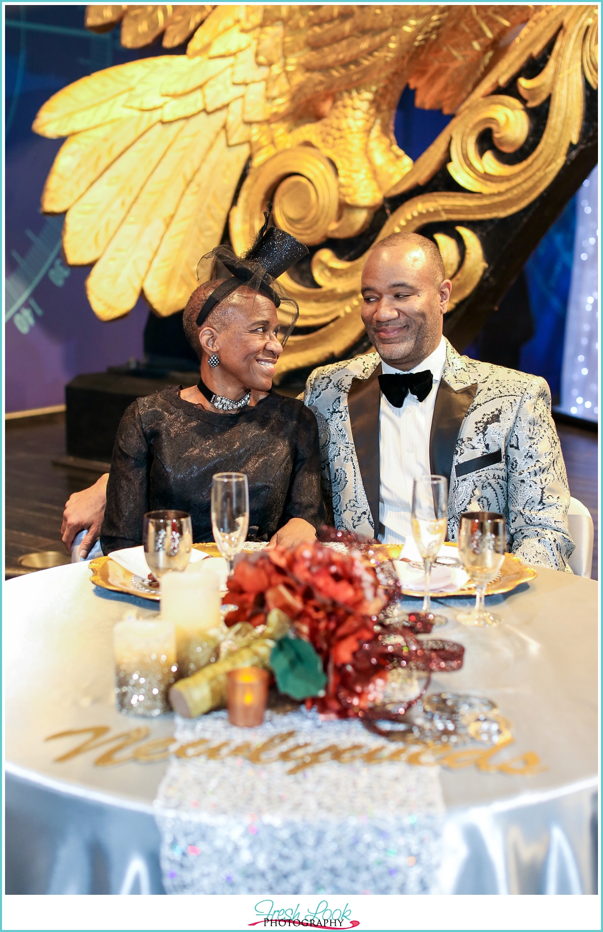 bride and groom at sweetheart table