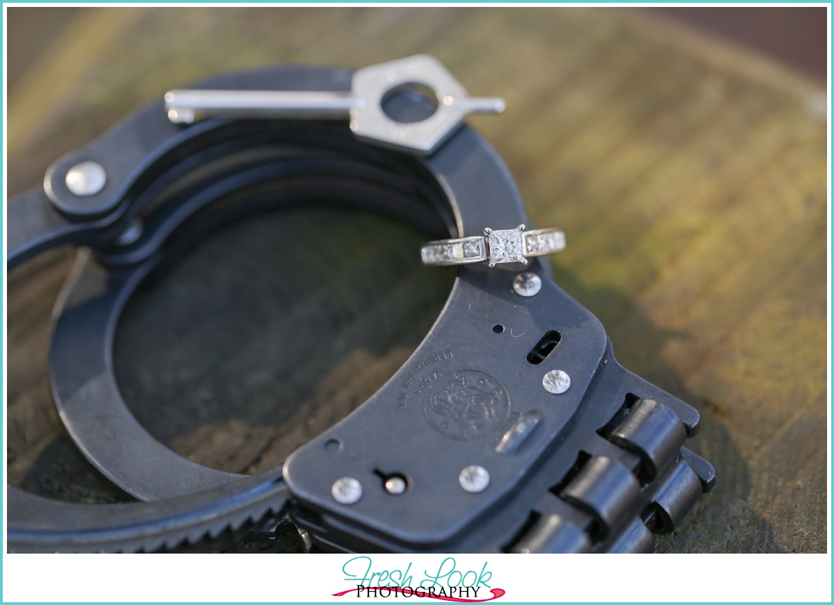 engagement ring and handcuffs