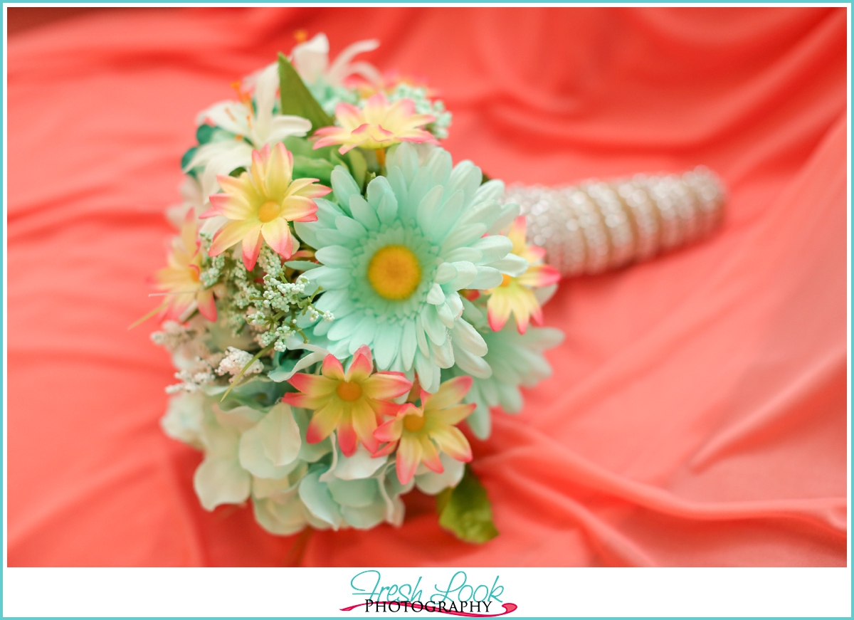 teal and coral wedding bouquet