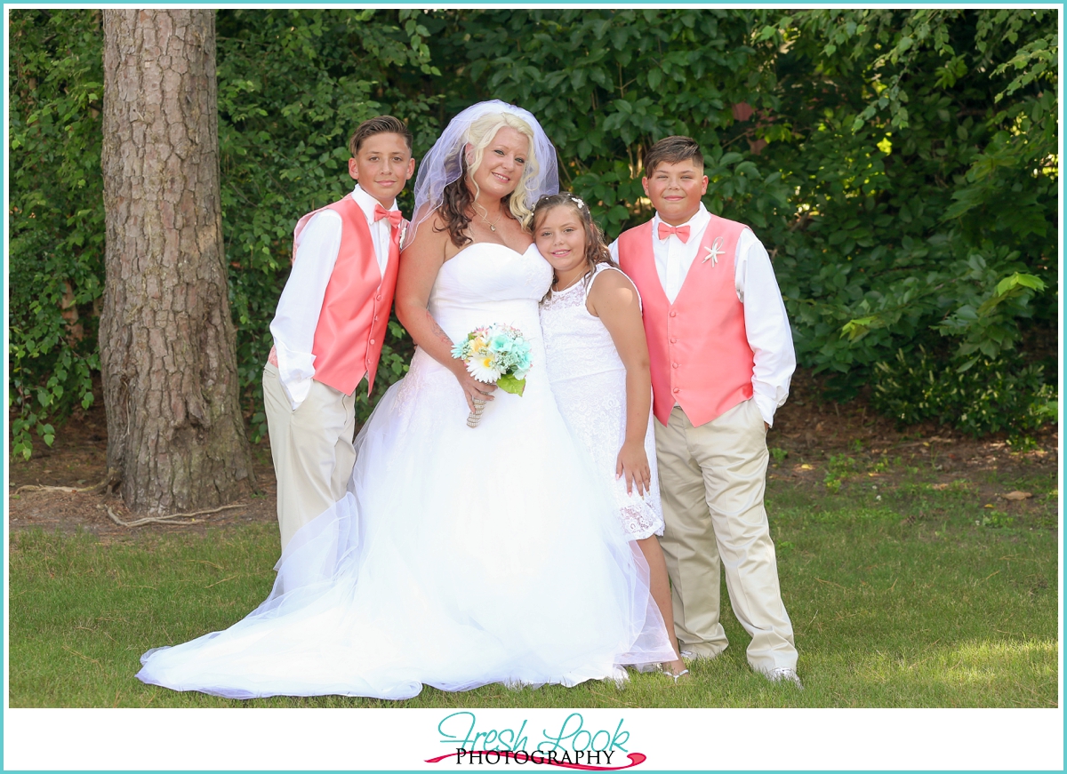 bride and kids wedding photo