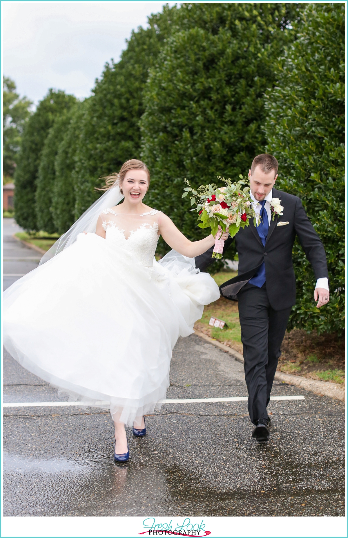 windy day bride and groom photos