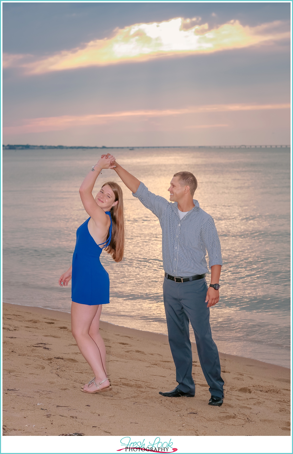 couple dancing on the beach