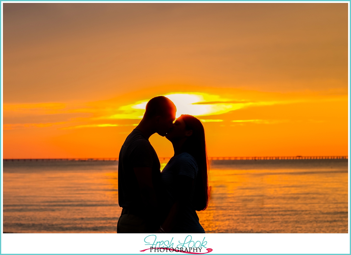 sunset silhouette engagement shoot