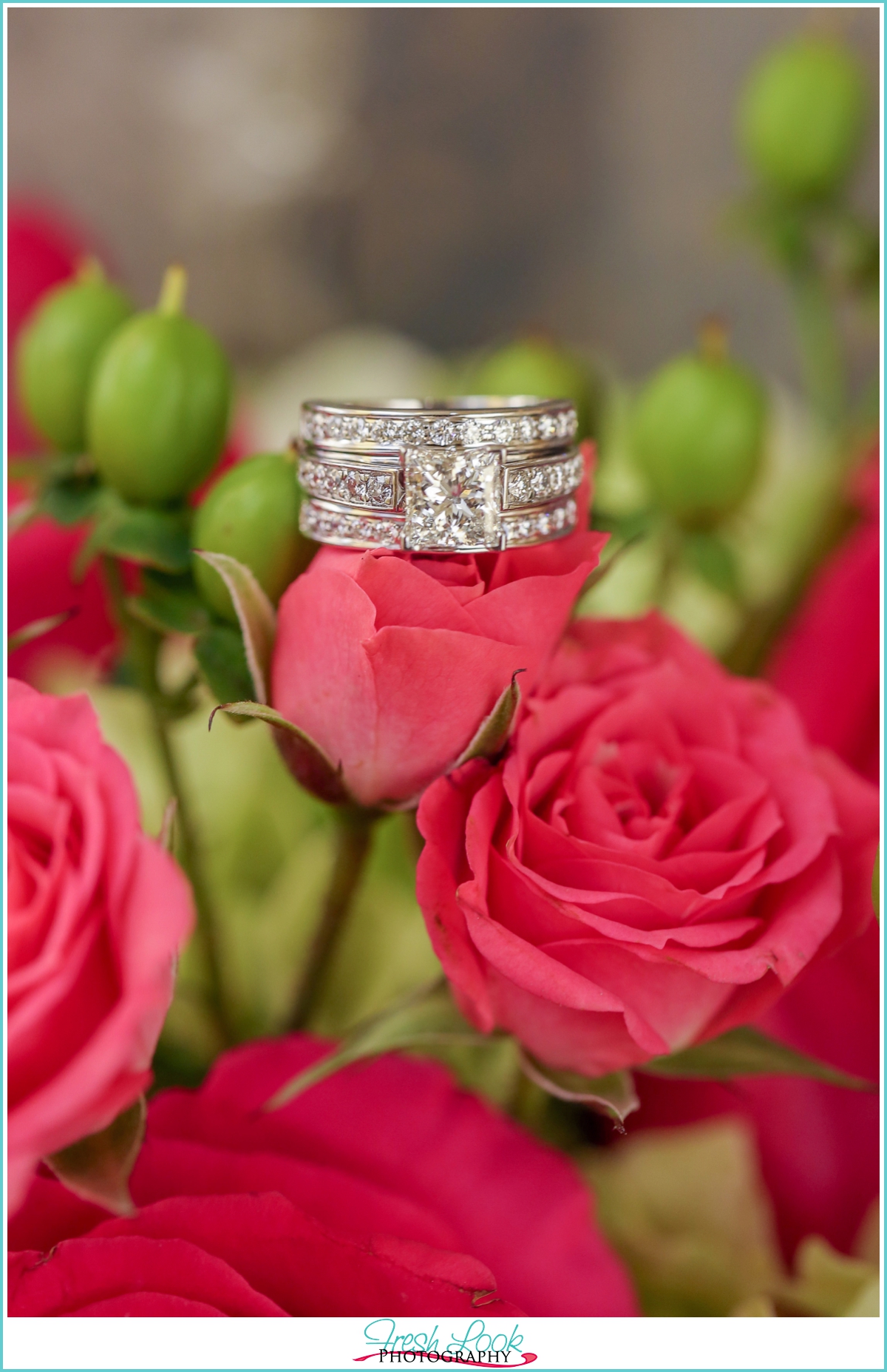 princess cut engagement ring and roses