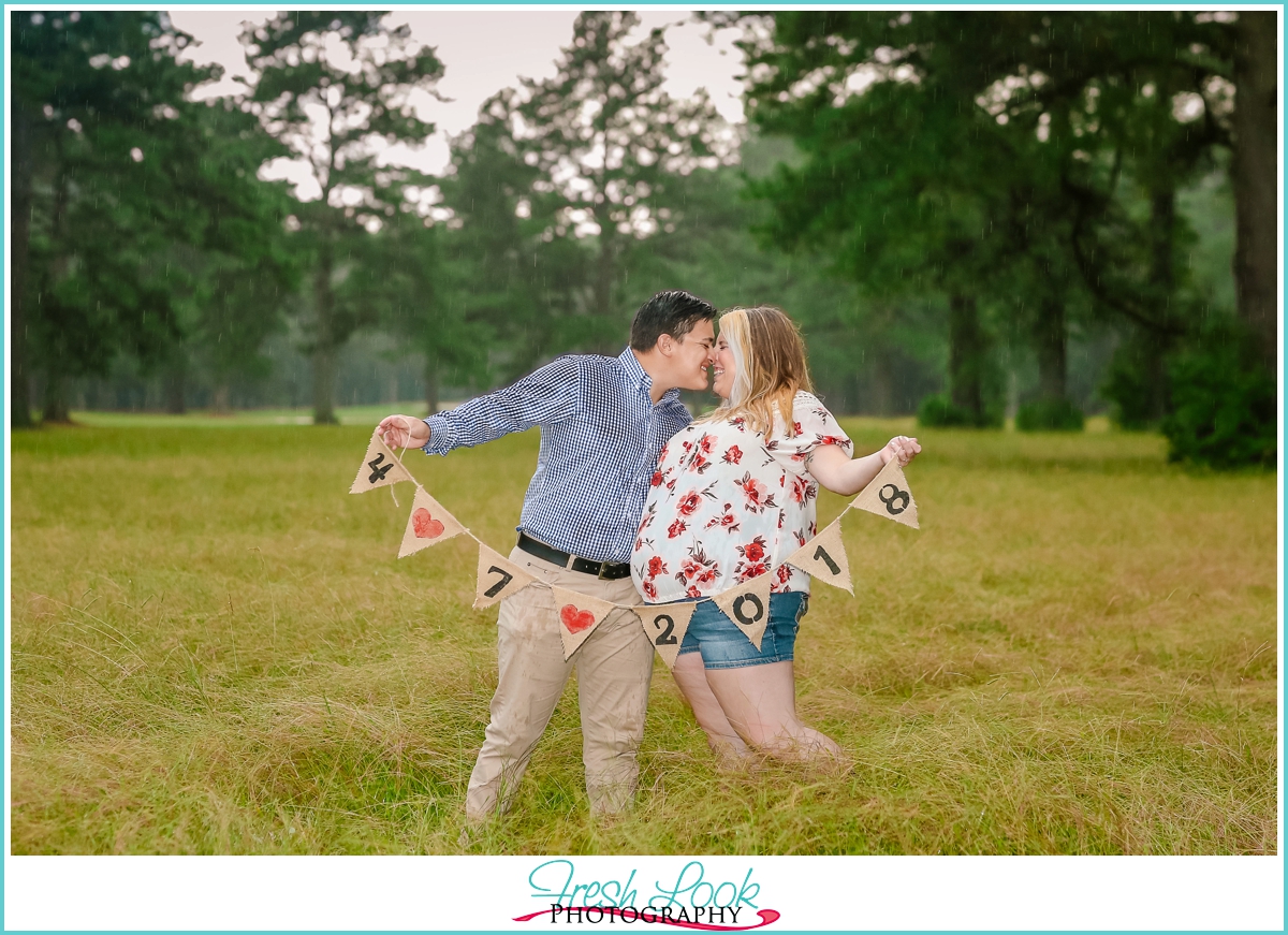 Virginia Beach engagement photos in a field