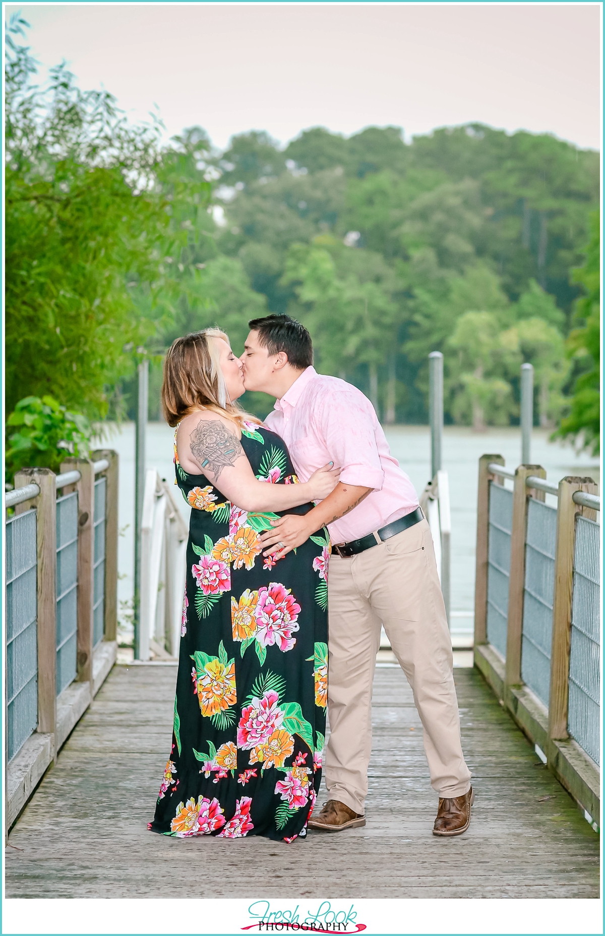 kissing in the rain enagement shoot