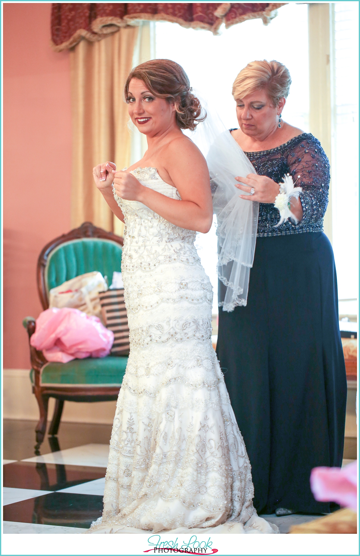 bride and mother getting ready for the wedding
