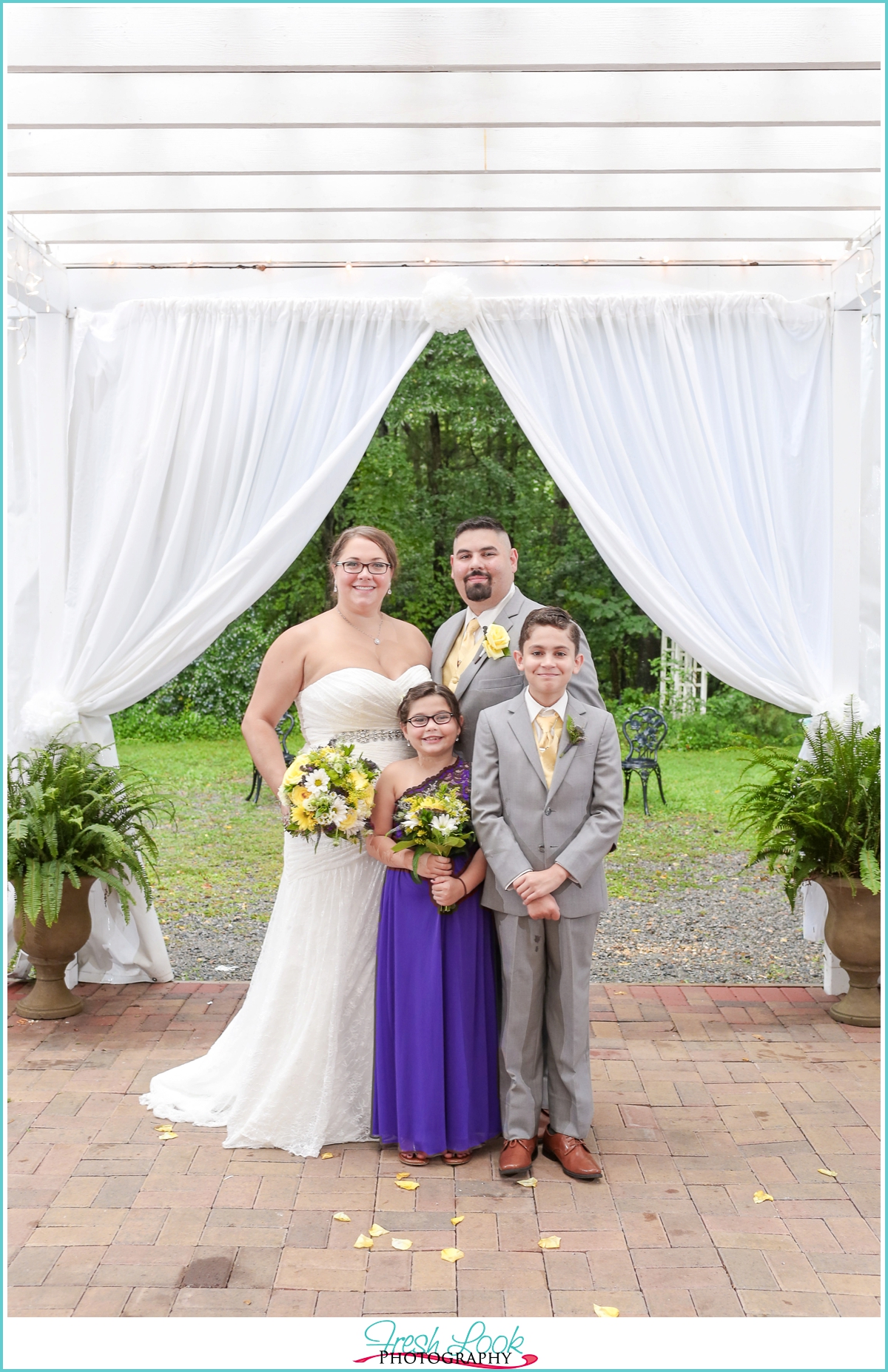 family of four wedding photo