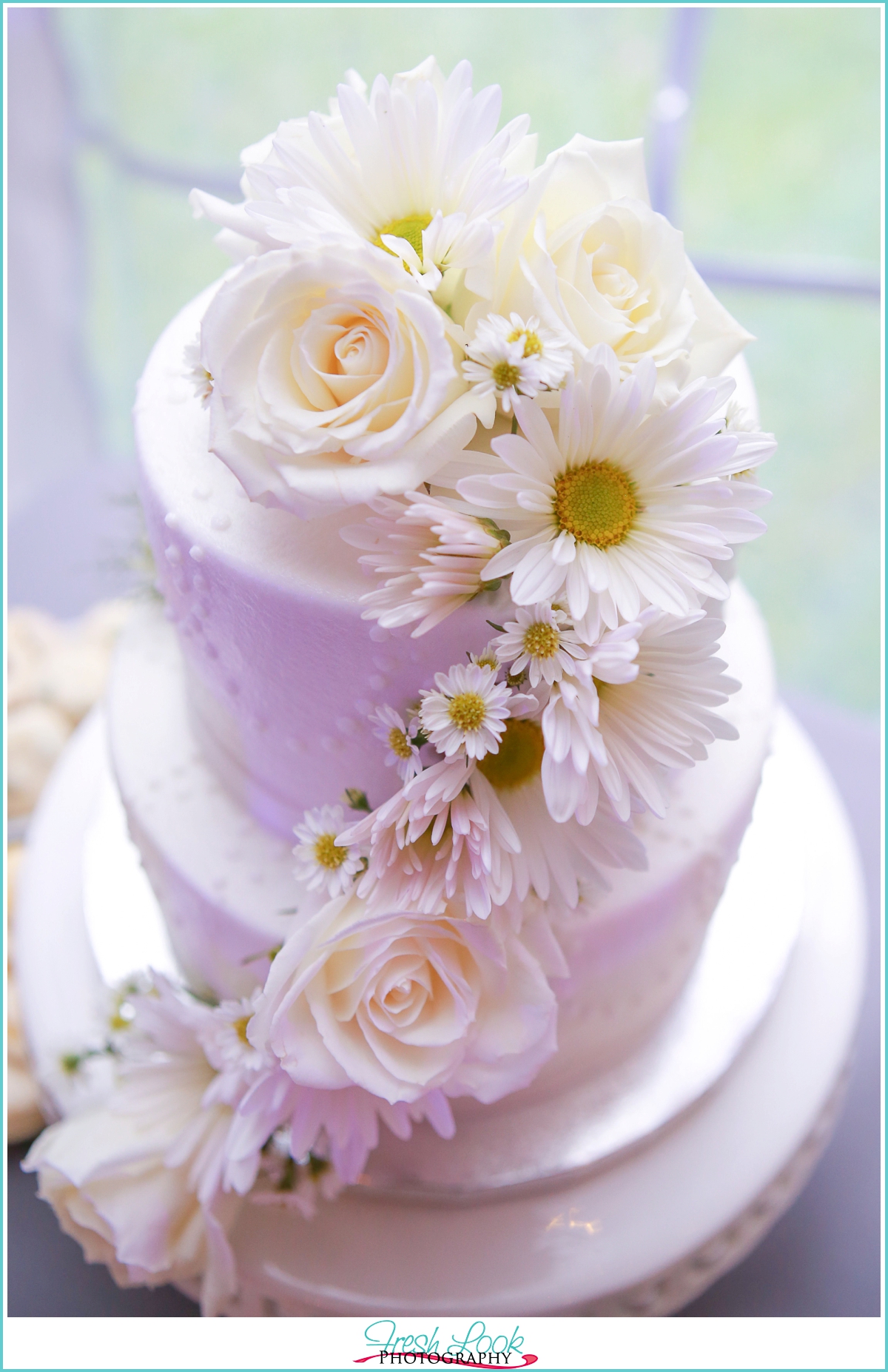 three tier white wedding cake