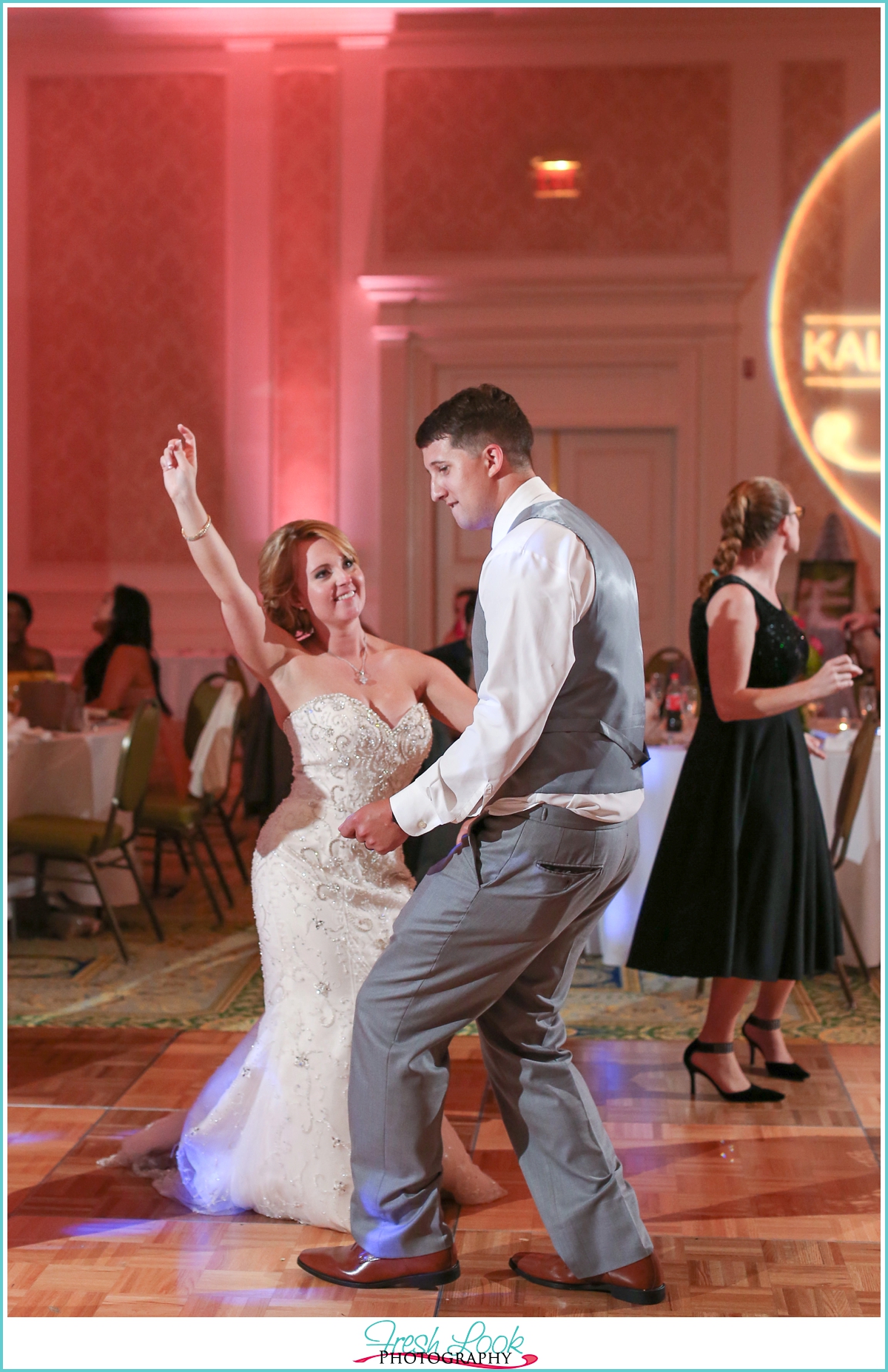 bride and groom partying at reception