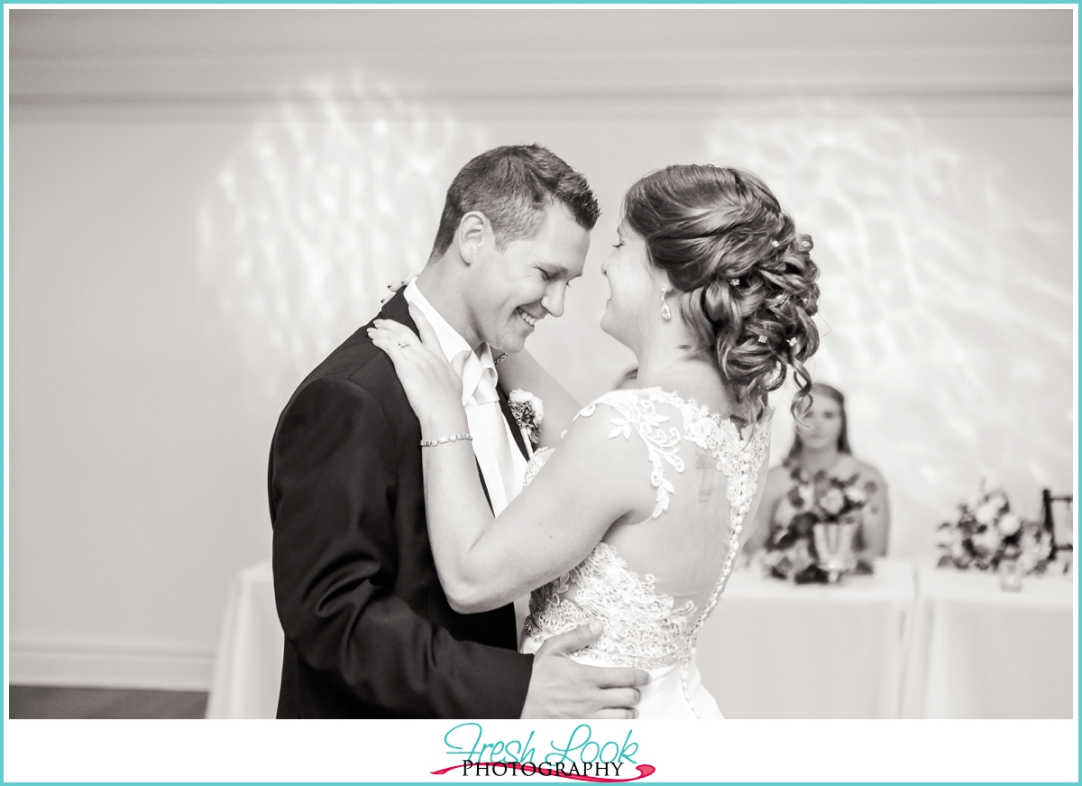 emotional bride and groom first dance