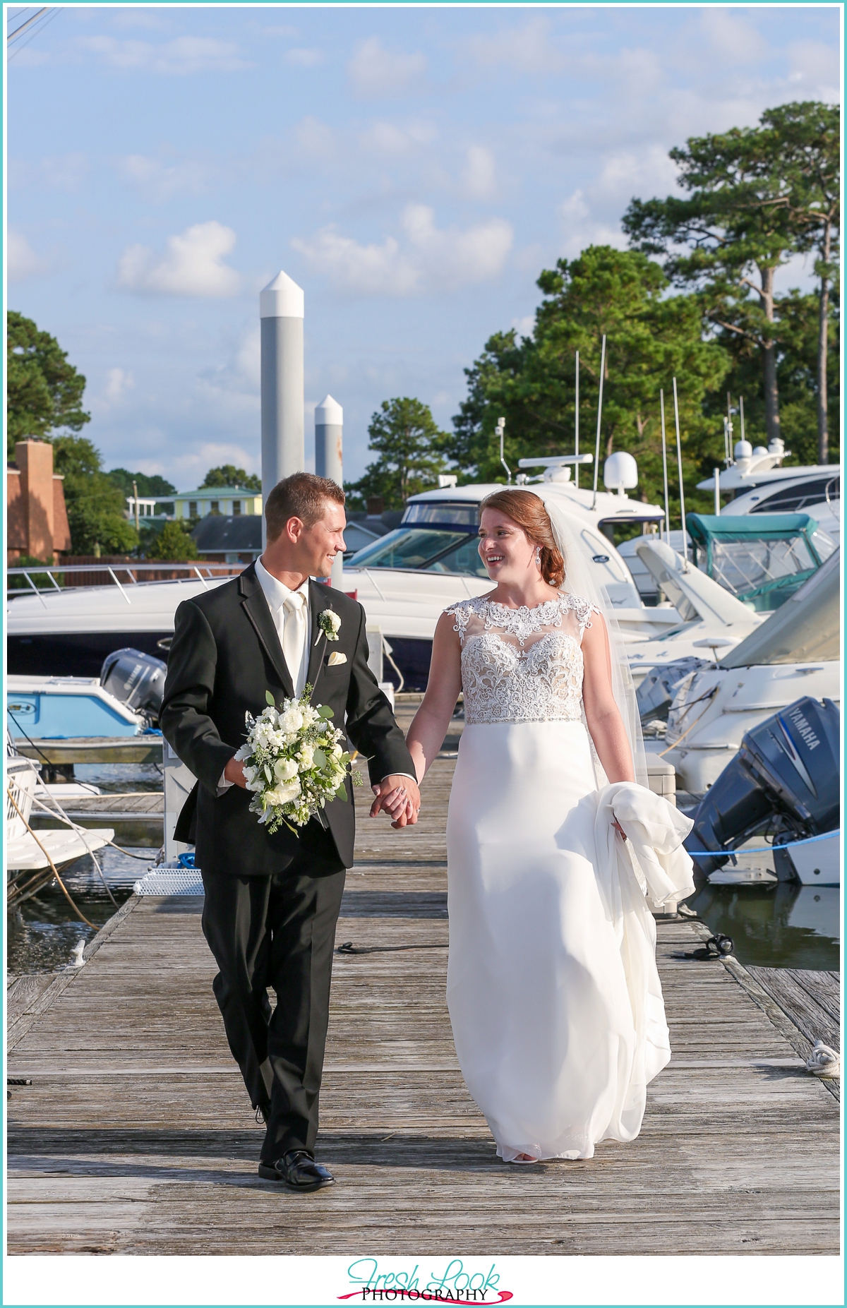 bride and groom walking hand in hand