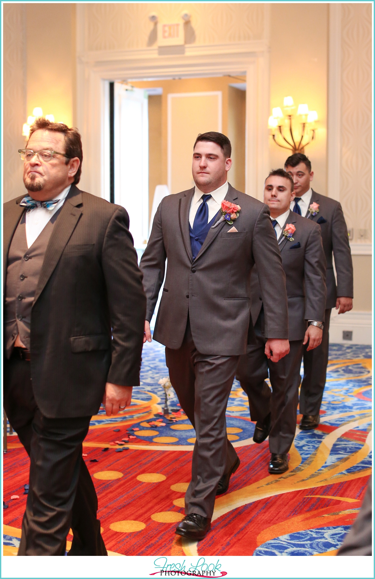 groom walking into the wedding