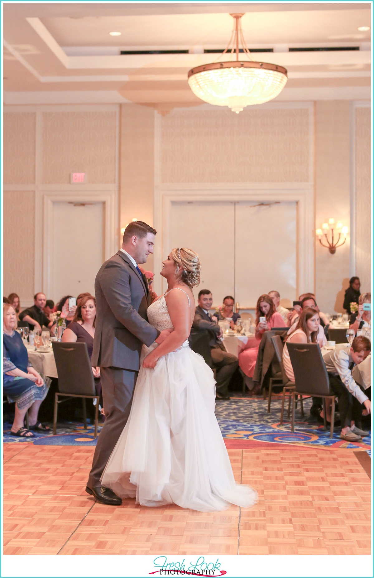 bride and groom first dance at reception