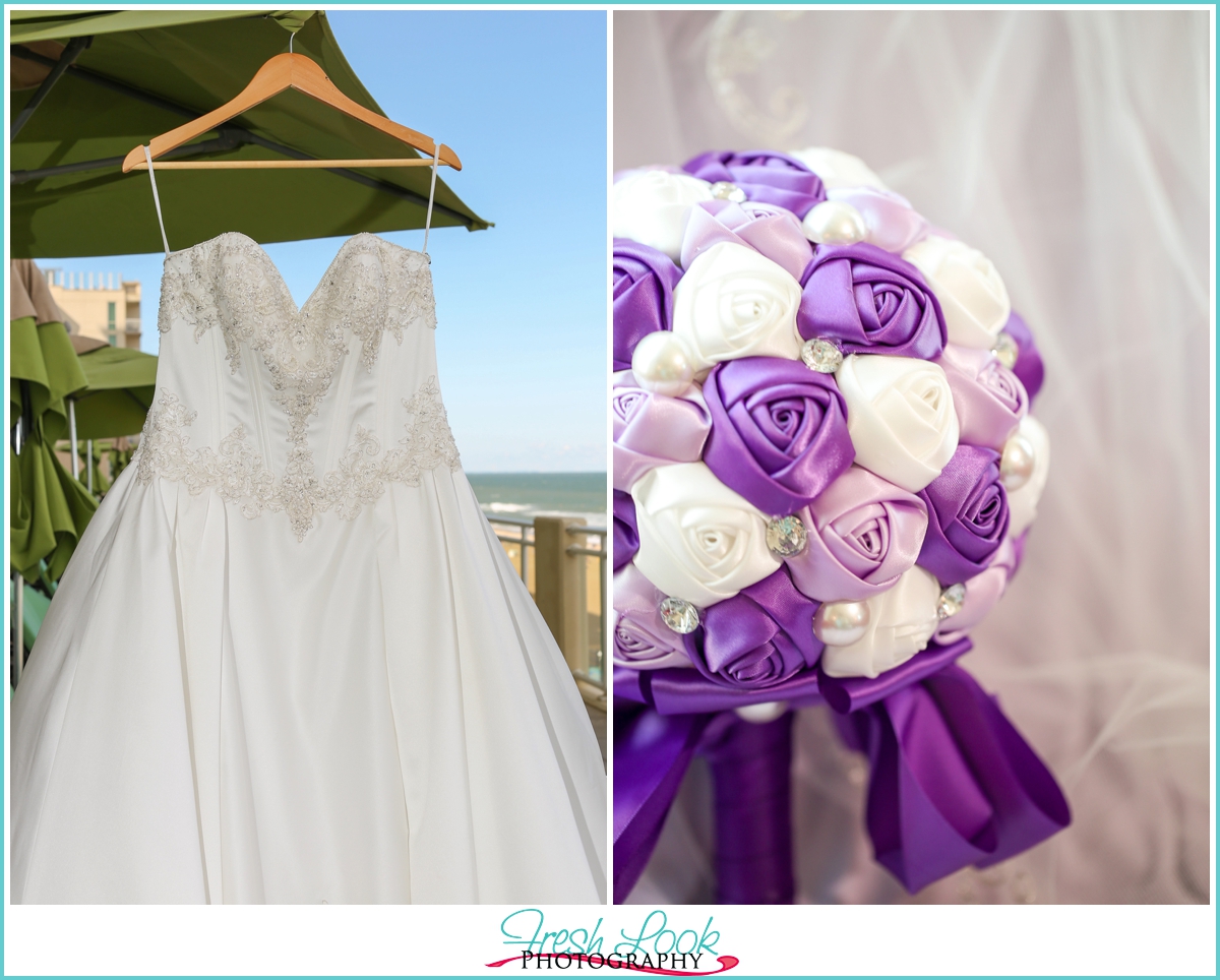 satin wedding dress and purple bouquet