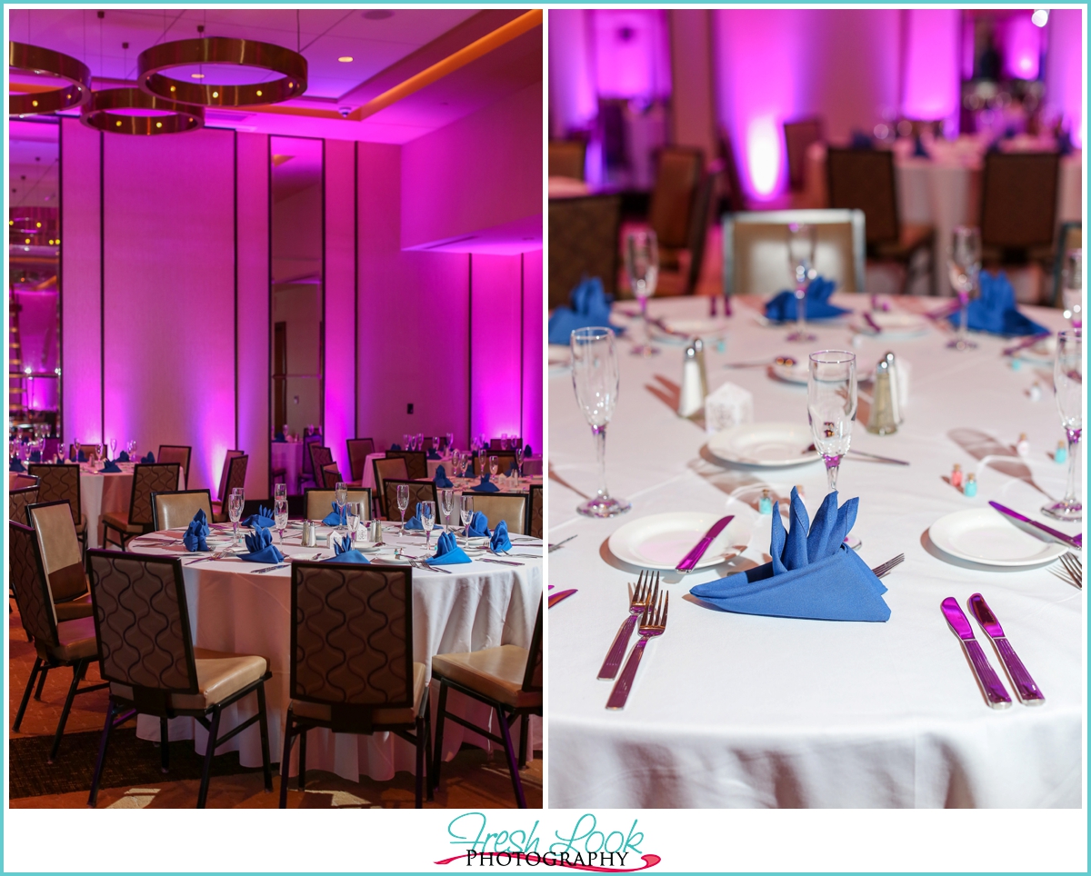 wedding reception with pink lighting