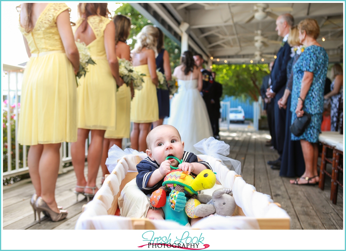 sweet little baby during the wedding ceremony