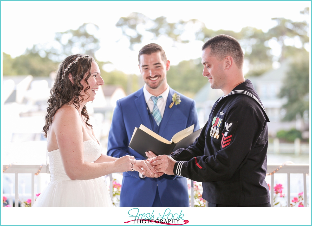 exchanging rings at wedding ceremony